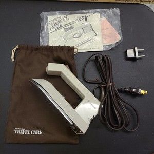Norelco Travel Care Spray Travel Iron T165 Instructions Bag wall plug converter